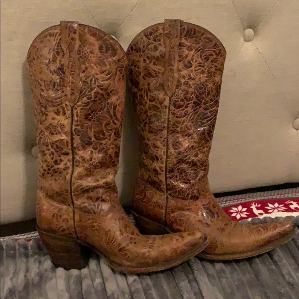 Cowgirl boots, come just under the knee.